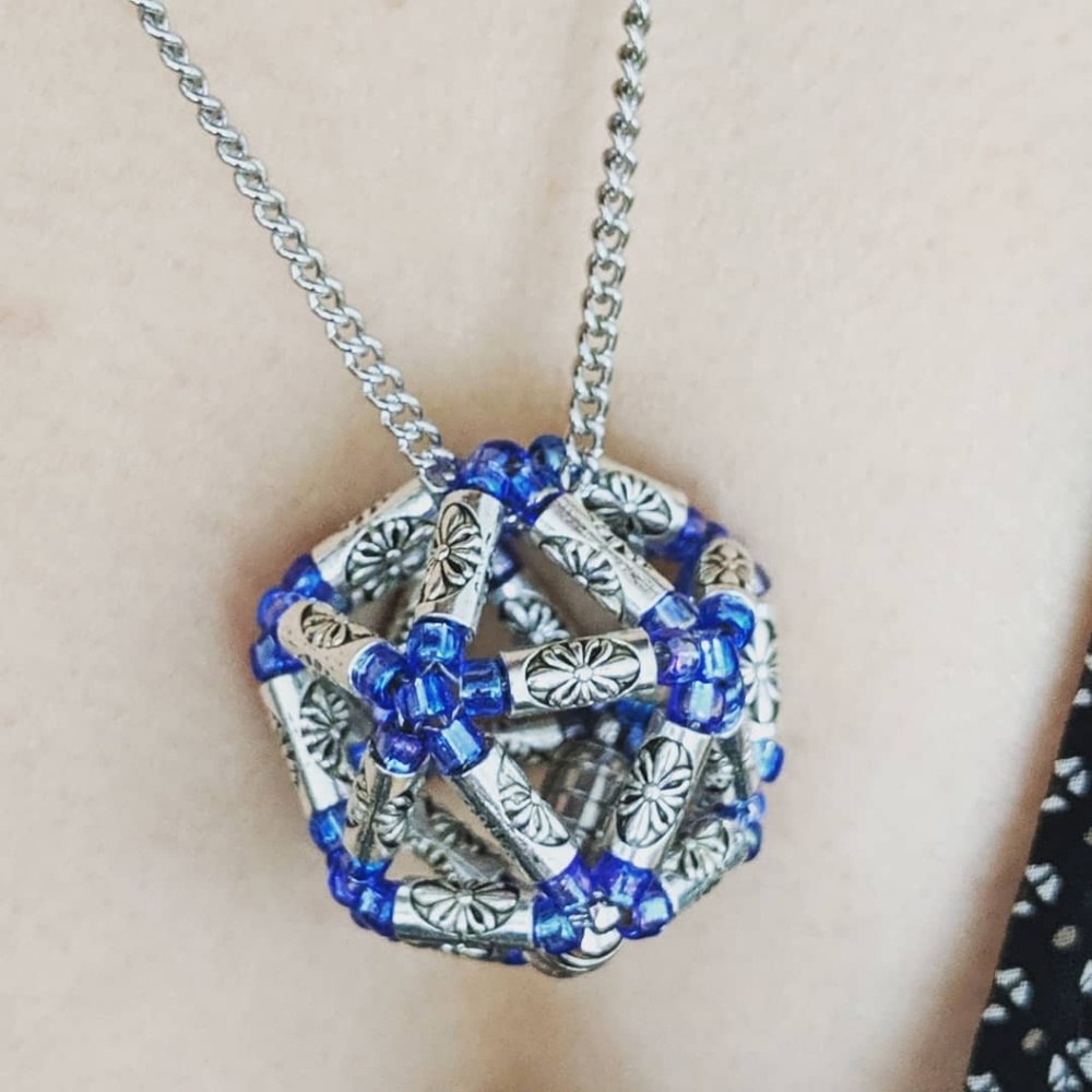 Blue metal flower geometric shape necklace